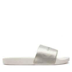 Klapki Calvin Klein Jeans. Niebieskie klapki damskie Calvin Klein Jeans, bez wzorów, z jeansu, bez obcasa, bez zapięcia. Za 129.99 zł.