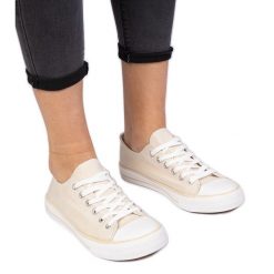 Brązowe klasyczne damskie trampki beżowy. Brązowe trampki i tenisówki damskie bez wzorów, z jeansu, bez zapięcia. Za 75.95 zł.