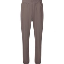 Damskie spodnie dresowe Athlecia Guyana. Brązowe spodnie dresowe damskie Athlecia, bez wzorów, z dresówki, sportowe. Za 192.00 zł.