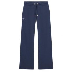 Damskie spodnie dresowe Superdry Essential. Niebieskie spodnie sportowe damskie Superdry, bez wzorów, z dresówki, sportowe, długie. W wyprzedaży za 253.50 zł.