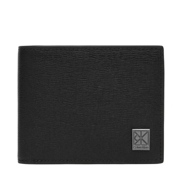 Portfel Calvin Klein. Czarne portfele męskie Calvin Klein, bez wzorów. Za 329.99 zł.