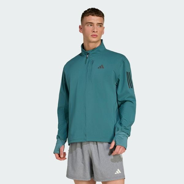 Kurtka Own The Run Winterized. Niebieskie kurtki męskie Adidas, na zimę, m, bez wzorów, z elastanu, bez kaptura, do biegania, ClimaWarm (Adidas). Za 245.00 zł.