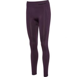 Damskie legginsy bezszwowe z wysokim stanem Hummel Shaping. Fioletowe legginsy damskie Hummel, bez wzorów, z materiału. Za 166.00 zł.