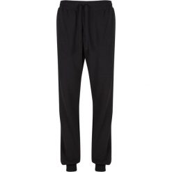 Spodnie dresowe dla kobiet Urban Classics Light Terry. Czarne spodnie dresowe damskie Urban Classics, bez wzorów, z dresówki, sportowe, długie. Za 183.50 zł.