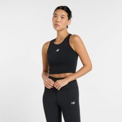 Koszulka damska New Balance WT51156BK – czarna. Czarne koszulki sportowe damskie New Balance, s, z aplikacjami, z materiału, bez ramiączek, do biegania. Za 129.99 zł.