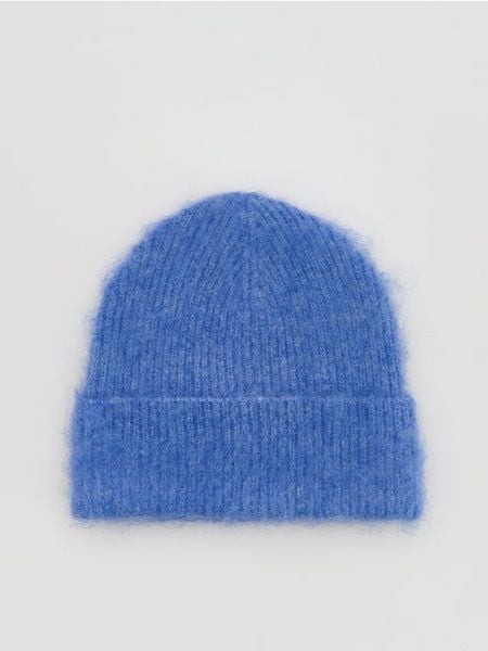 Czapka beanie - niebieski. Niebieskie czapki damskie Reserved, bez wzorów. Za 59.99 zł.