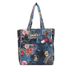 Torebka Tommy Jeans. Niebieskie shopperki damskie Tommy Jeans, bez wzorów, z jeansu, bez dodatków. Za 449.99 zł.