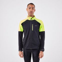 Kurtka do biegania męska Kiprun Run 900 Warm Regul. Czarne kurtki męskie KIPRUN, m, bez wzorów, z materiału, bez kaptura, do biegania. Za 299.99 zł.
