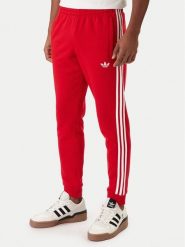 Adidas Spodnie dresowe 3-Stripes KE3560 Czerwony Slim Fit. Czerwone spodnie sportowe męskie Adidas, m, bez wzorów, z bawełny. Za 229.99 zł.