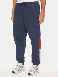 New Balance Spodnie dresowe MP43522NNY Niebieski Relaxed Fit. Niebieskie spodnie sportowe męskie New Balance, l, bez wzorów, z dresówki. Za 209.99 zł.