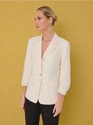 Marynarka z domieszką lnu - kremowy. Białe marynarki i żakiety damskie Sinsay, bez wzorów, bez kołnierzyka, bez ramiączek. Za 69.99 zł.