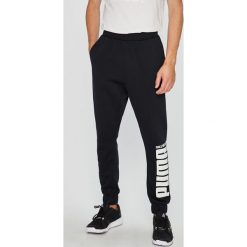 Puma - Spodnie. Szare spodnie materiałowe męskie Puma, bez wzorów, z bawełny. W wyprzedaży za 159.90 zł.