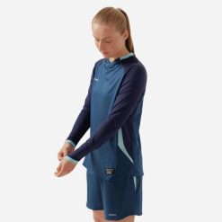 Koszulka do piłki nożnej z długim rękawem damska Kipsta krój slim. Niebieskie bluzki damskie KIPSTA, xl, bez wzorów, z materiału, sportowe, bez kołnierzyka, bez ramiączek. Za 129.99 zł.