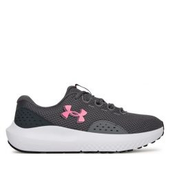 Buty do biegania Under Armour. Szare obuwie sportowe damskie Under Armour, bez wzorów, bez zapięcia, do biegania. Za 169.99 zł.