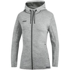 Kurtka Jako femme à capuche Premium Basics. Szare kurtki sportowe damskie Jako, bez wzorów, bez ramiączek, bez kaptura, na fitness i siłownię. Za 432.50 zł.