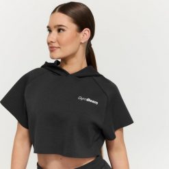 Bluza damska fitness z kapturem Cropped Relay Black. Czarne bluzy damskie GYMBEAM, m, bez wzorów, z materiału, klasyczne, bez ramiączek, z kapturem. Za 125.90 zł.
