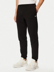 Lacoste Spodnie dresowe XH9833 Czarny Regular Fit. Czarne spodnie sportowe męskie Lacoste, m, bez wzorów, z bawełny. Za 549.99 zł.