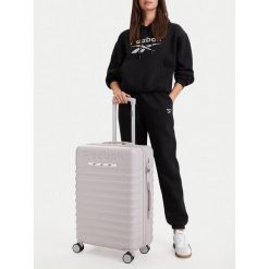 Walizka średnia Reebok. Fioletowe walizki damskie Reebok, bez wzorów, średnie. Za 319.99 zł.