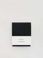 Rajstopy z metalizowaną nitką 30 DEN - czarny. Czarne rajstopy i pończochy Reserved, bez wzorów. Za 39.99 zł.