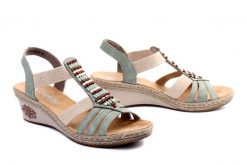 RIEKER V2451-52 green, sandały damskie. Zielone sandały damskie Rieker, bez wzorów, bez obcasa, na koturnie, bez zapięcia. Za 179.94 zł.