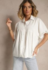 Biała Koszula z Wiskozą Ozdobiona Falbankami Oleldi. Białe koszule damskie Renee, bez wzorów, z jeansu, eleganckie, bez kołnierzyka, bez ramiączek. Za 54.99 zł.