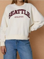 Bluza crewneck - kremowy. Białe bluzy damskie Sinsay, l, bez wzorów, bez ramiączek, bez kaptura. Za 45.99 zł.
