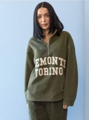 Polarowa bluza half-zip z napisem - zielony. Zielone bluzy damskie Sinsay, l, bez wzorów, z polaru, bez ramiączek, bez kaptura. Za 59.99 zł.