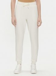 Tommy Hilfiger Spodnie dresowe UW0UW04785 Écru Regular Fit. Spodnie dresowe damskie Tommy Hilfiger, bez wzorów, z dresówki. Za 209.99 zł.