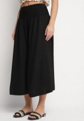 Czarne Szerokie Spodnie Typu Kuloty Ozdobione Marszczeniem Fenalida. Czarne spodnie materiałowe damskie Born2be, bez wzorów, z jeansu, eleganckie. Za 49.99 zł.