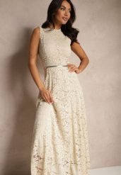 Beżowa Koronkowa Sukienka Taliowana Wilreti. Brązowe sukienki damskie Renee, na spotkanie biznesowe, m, bez wzorów, z koronki, eleganckie, bez kołnierzyka, bez ramiączek, maxi, dopasowane. Za 149.99 zł.