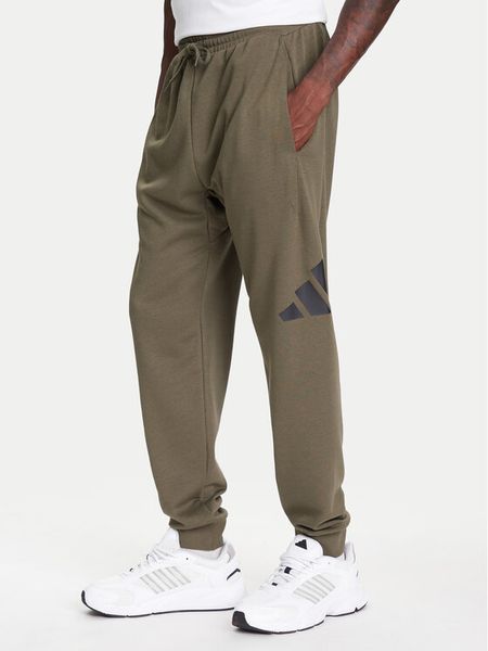 Adidas Spodnie dresowe Essentials Big Logo JE8970 Khaki Regular Fit. Brązowe spodnie sportowe męskie Adidas, m, bez wzorów, z bawełny. Za 139.99 zł.