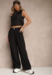 Czarne Spodnie o Szerokim Kroju z Bawełną High Waist Ozdobione Naszywką Naneriela. Czarne spodnie materiałowe damskie Renee, z aplikacjami, z bawełny, eleganckie, z podwyższonym stanem. Za 49.99 zł.