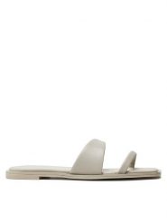 Calvin Klein Klapki Flat Slide Lth HW0HW02071 Beżowy. Brązowe klapki damskie Calvin Klein, bez wzorów, ze skóry, bez obcasa, bez zapięcia. Za 319.99 zł.