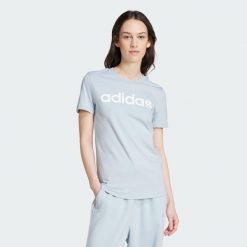 T-shirt damski z logo adidas Essentials. Białe t-shirty damskie Adidas, s, bez wzorów, z bawełny, klasyczne, bez kołnierzyka, bez ramiączek. Za 89.00 zł.
