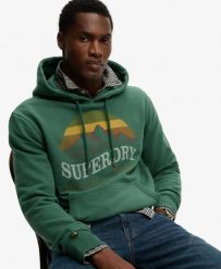 Superdry Bluza z kapturem Outdoors Mountain Relaxed – Hunter Green. Zielone bluzy damskie Superdry, l, bez wzorów, z bawełny, bez ramiączek, z kapturem. Za 289.00 zł.