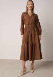 Brązowa Bawełniano-Wiskozowa Sukienka Koszulowa z Imitacją Kieszeni Biriala. Brązowe sukienki damskie Born2be, na co dzień, l, bez wzorów, z bawełny, eleganckie, bez kołnierzyka, bez ramiączek, maxi, koszulowe. Za 149.99 zł.