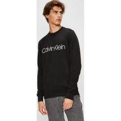 Calvin Klein - Bluza. Brązowe bluzy męskie Calvin Klein, l, bez wzorów, z bawełny, bez ramiączek, bez kaptura. W wyprzedaży za 279.90 zł.