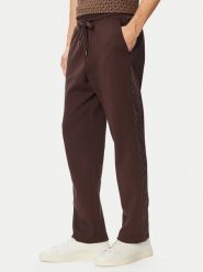 MICHAEL Michael Kors Spodnie dresowe CF552Q65MF Brązowy ciemny Regular Fit. Brązowe spodnie sportowe męskie MICHAEL Michael Kors, l, bez wzorów, z bawełny. Za 789.99 zł.