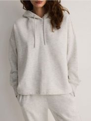 Bluza z kapturem - jasnoszary. Szare bluzy damskie Reserved, l, bez wzorów, z bawełny, bez ramiączek, z kapturem. W wyprzedaży za 69.99 zł.