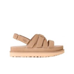 Damskie sandały Ugg W Goldenstar Gleam 1175122-MDS. Brązowe sandały damskie UGG, bez wzorów, z materiału, z okrągłym noskiem, bez obcasa, bez zapięcia. Za 557.90 zł.