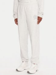 Tommy Jeans Spodnie dresowe DW0DW21702 Szary Regular Fit. Szare spodnie dresowe damskie Tommy Jeans, bez wzorów, z bawełny. Za 329.99 zł.