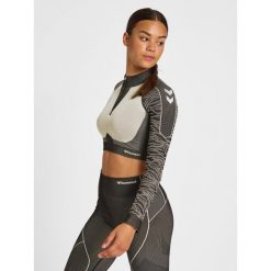 Damska bluza z zamkiem 1/2 crop Hummel MT Mila. Czarne bluzy damskie Hummel, bez wzorów, sportowe, bez ramiączek, bez kaptura. W wyprzedaży za 213.50 zł.