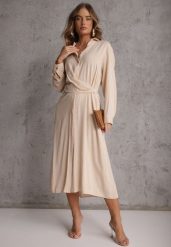 Beżowa Koszulowa Sukienka z Wiskozy z Asymetrycznym Drapowaniem i Guzikiem Hetasa. Brązowe sukienki damskie Renee, na co dzień, l, bez wzorów, z wiskozy, eleganckie, z asymetrycznym kołnierzem, bez ramiączek, asymetryczne. Za 149.99 zł.
