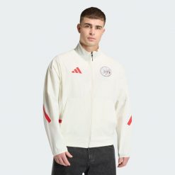 Bluza reprezentacyjna Ajax Amsterdam Z.N.E. Białe bluzy damskie Adidas, l, bez wzorów, z elastanu, sportowe, bez ramiączek, bez kaptura. Za 335.30 zł.
