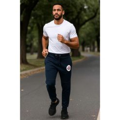Geographical Norway Jogging Pant MIRABEL MEN 100 EO-PR+BS (SU1204H/GN/Navy). Niebieskie spodnie sportowe męskie Geographical Norway, bez wzorów, do biegania. Za 109.00 zł.