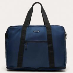 Torba podróżna unisex Oakley PACKABLE 42 L granatowa FOS901958-6GA. Niebieskie torby podróżne damskie Oakley, z aplikacjami, z materiału, na ramię. Za 272.39 zł.