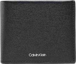 Calvin Klein Portfel marki Calvin Klein model K50K509989 kolor Czarny. Akcesoria Męskie. Sezon: Jesień/Zima NoSize. Czarne portfele męskie Calvin Klein, bez wzorów. Za 204.80 zł.