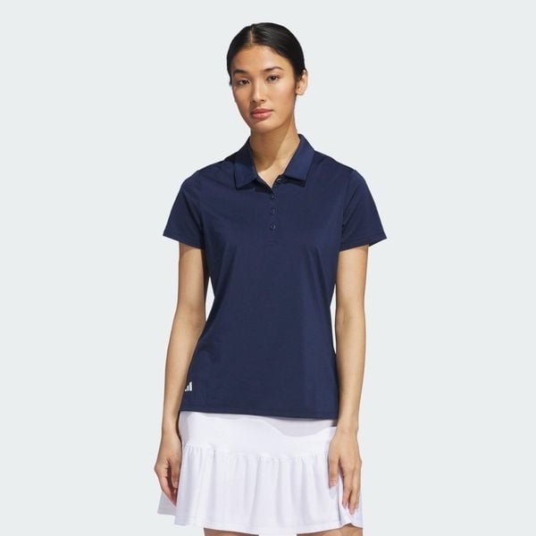 Koszulka polo z krótkim rękawem Ultimate365 Solid. Niebieskie bluzki damskie Adidas, bez wzorów, z materiału, sportowe, bez kołnierzyka, bez ramiączek. Za 219.00 zł.