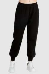 ALEXANDER MCQUEEN Czarne dresowe spodnie damskie. Czarne spodnie dresowe damskie alexander mcqueen, bez wzorów, z bawełny. W wyprzedaży za 999.99 zł.