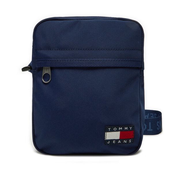 Saszetka Tommy Jeans. Niebieskie saszetki i nerki męskie Tommy Jeans, bez wzorów, z jeansu. Za 129.99 zł.